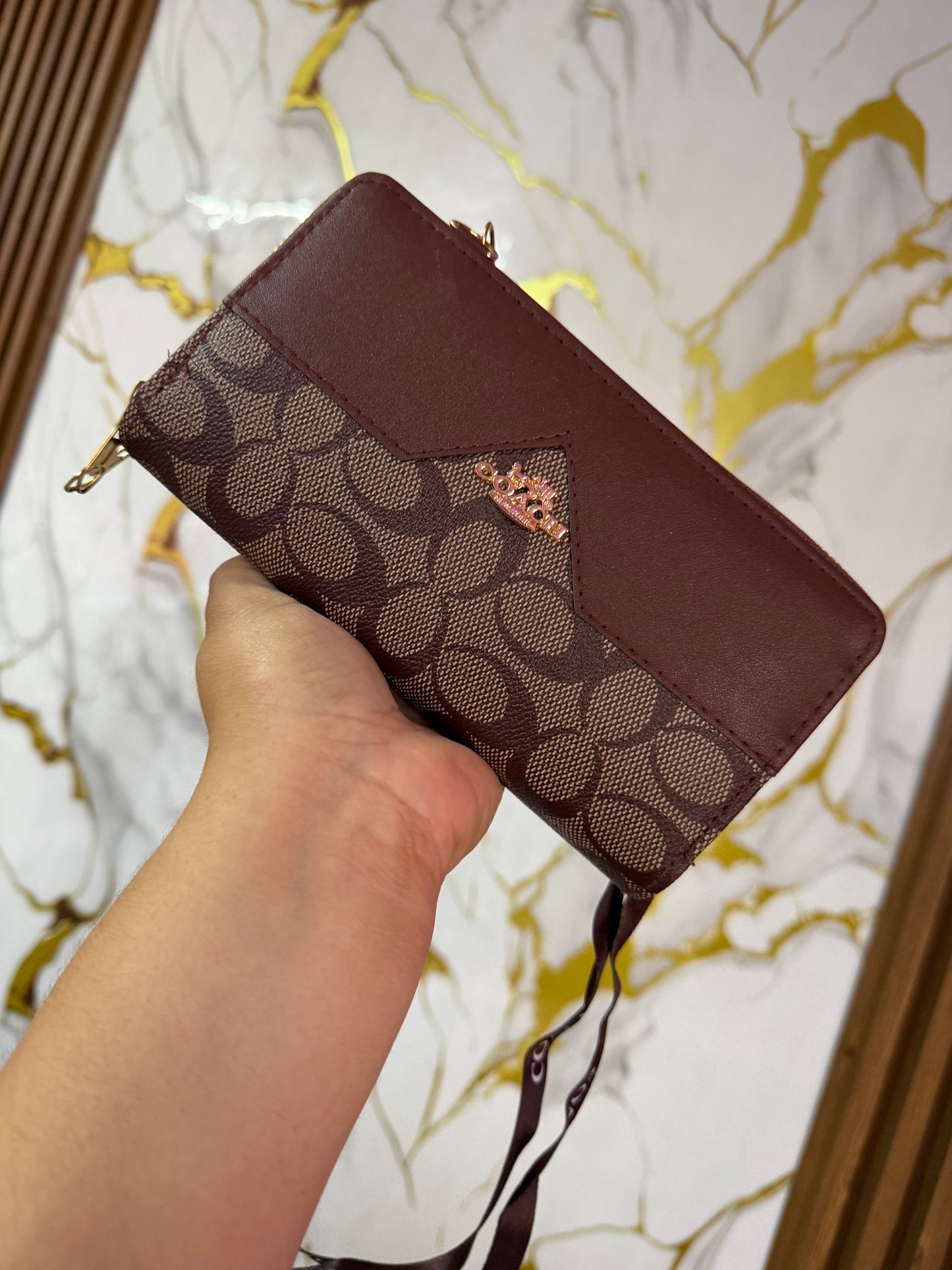 Cartera Coach