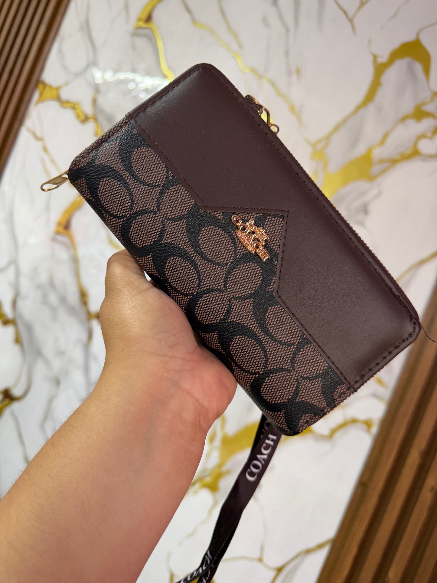 Cartera Coach