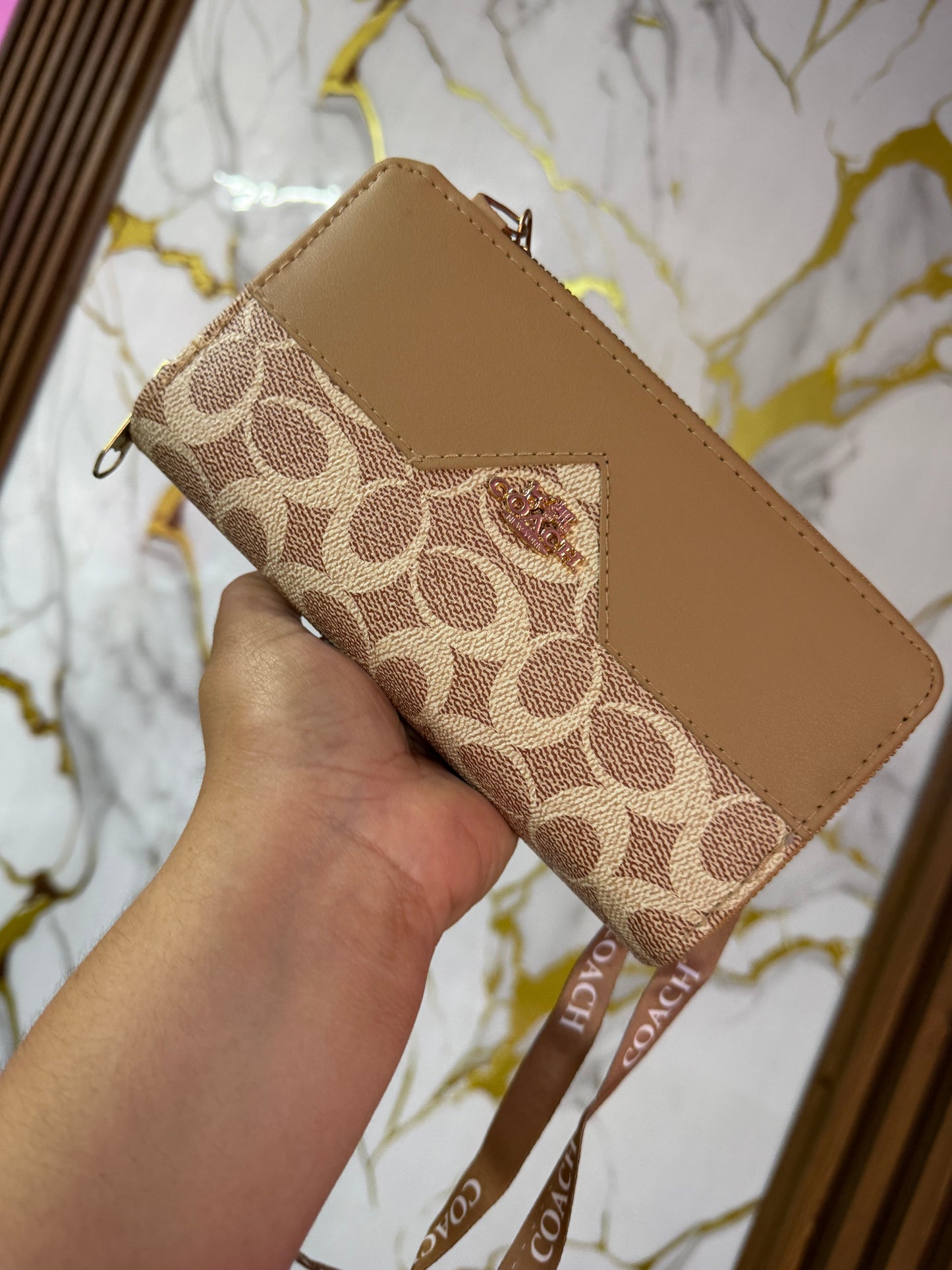 Cartera Coach