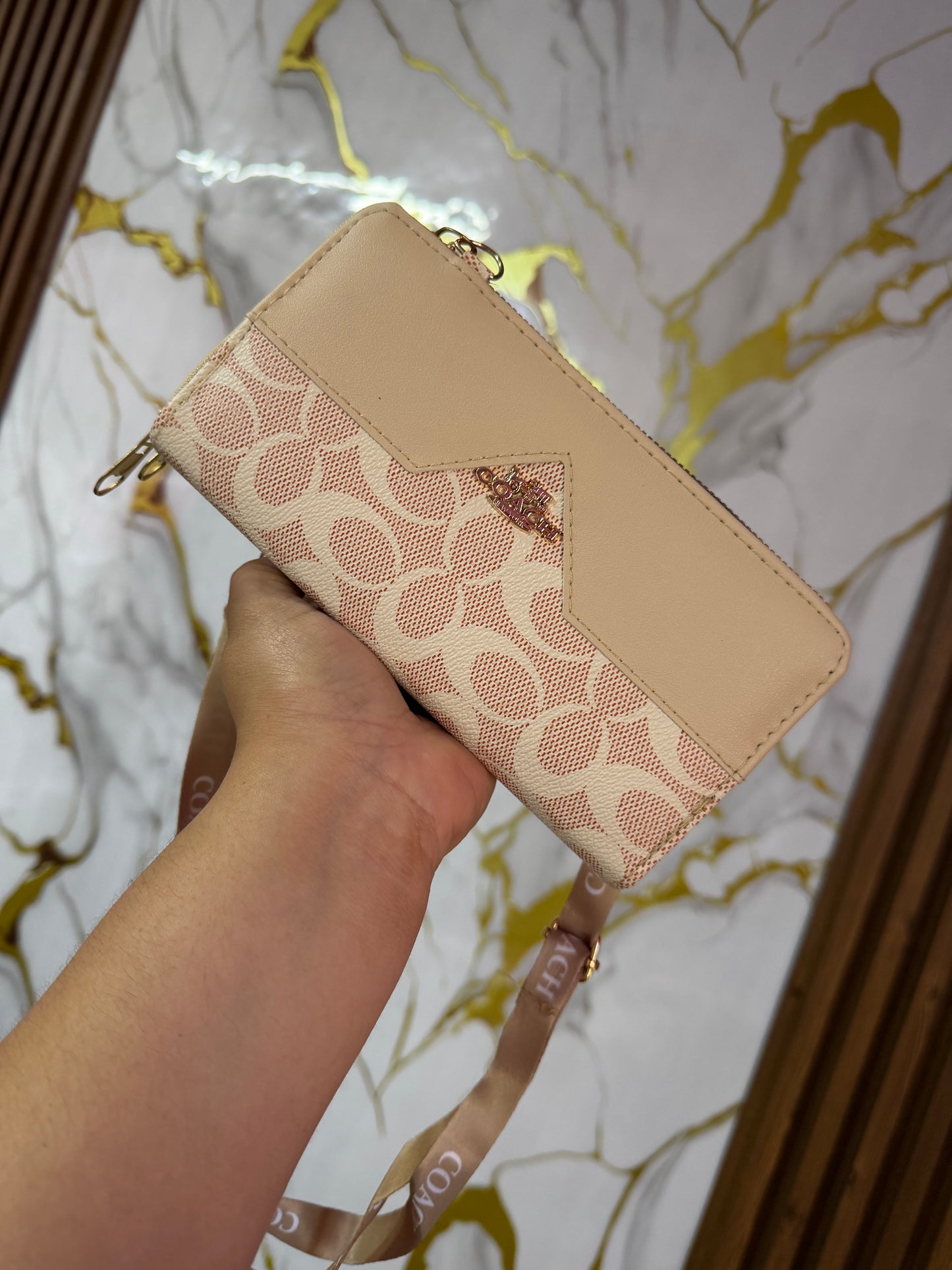 Cartera Coach
