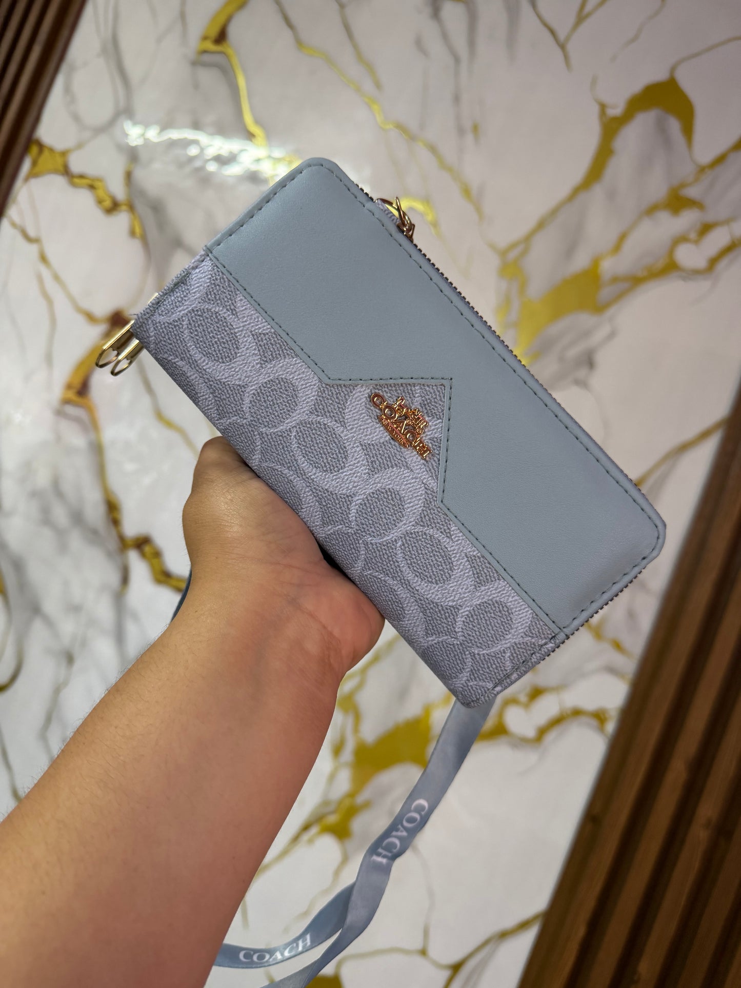 Cartera Coach